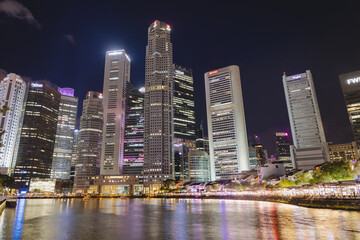 Naklejka premium Singapore Marina Bay and CBD Skyline at Night - Captured on December 24, 2025 from Riverside Cruise