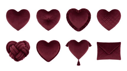 Burgundy velvet heart pillow set including knotted, ruffled, quilted, and tasseled designs with envelope clutch isolated. Romantic home decor collection.