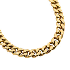 Obraz premium Elegant gold curb chain necklace close-up isolated on transparent background