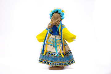 The Ukrainian motanka doll is an ancient amulet and symbol of Ukrainian culture, made without a face so as not to instill a soul in it. Instead of a face, a cross is often dangled to protect against e