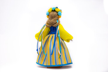 The Ukrainian motanka doll is an ancient amulet and symbol of Ukrainian culture, made without a face so as not to instill a soul in it. Instead of a face, a cross is often dangled to protect against e