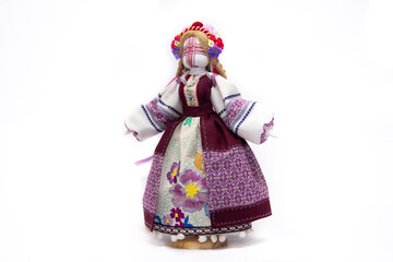 The Ukrainian motanka doll is an ancient amulet and symbol of Ukrainian culture, made without a face so as not to instill a soul in it. Instead of a face, a cross is often dangled to protect against e