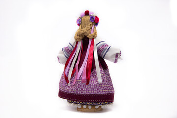 The Ukrainian motanka doll is an ancient amulet and symbol of Ukrainian culture, made without a face so as not to instill a soul in it. Instead of a face, a cross is often dangled to protect against e