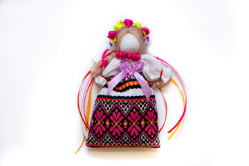 The Ukrainian motanka doll is an ancient amulet and symbol of Ukrainian culture, made without a face so as not to instill a soul in it. Instead of a face, a cross is often dangled to protect against e