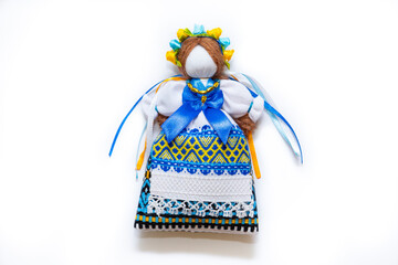 The Ukrainian motanka doll is an ancient amulet and symbol of Ukrainian culture, made without a face so as not to instill a soul in it. Instead of a face, a cross is often dangled to protect against e