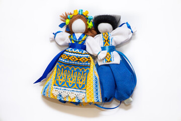The Ukrainian motanka doll is an ancient amulet and symbol of Ukrainian culture, made without a face so as not to instill a soul in it. Instead of a face, a cross is often dangled to protect against e