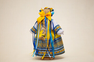 The Ukrainian motanka doll is an ancient amulet and symbol of Ukrainian culture, made without a face so as not to instill a soul in it. Instead of a face, a cross is often dangled to protect against e