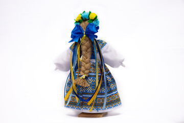 The Ukrainian motanka doll is an ancient amulet and symbol of Ukrainian culture, made without a face so as not to instill a soul in it. Instead of a face, a cross is often dangled to protect against e