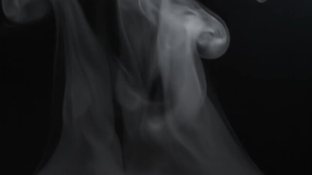 Smoke Clouds on Black Background.