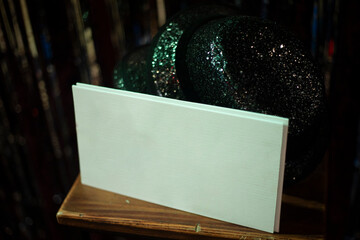 Blank sign for the name of the party. White sign for the name of the event.