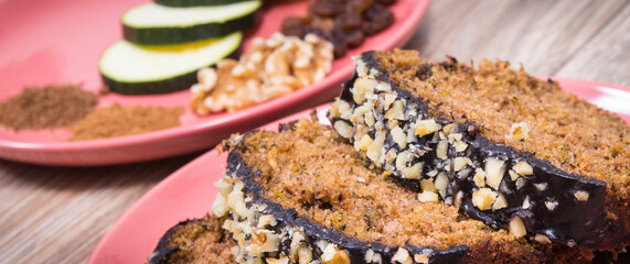Pieces of zucchini dough with nuts and raisins. Delicious dessert