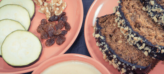 Fresh baked pastry made of zucchini and cup of white coffee. Delicious dessert