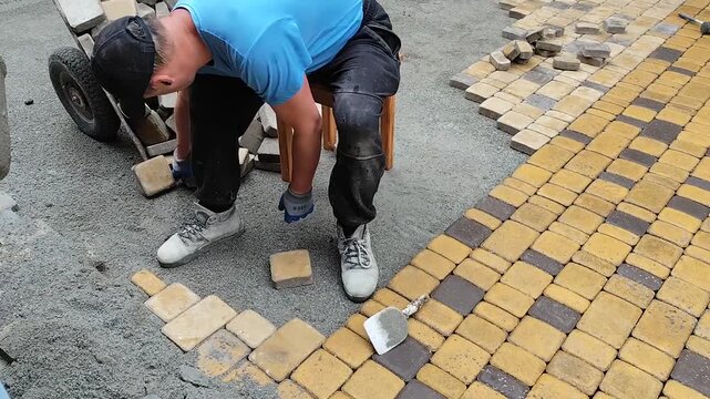 laying paving slabs