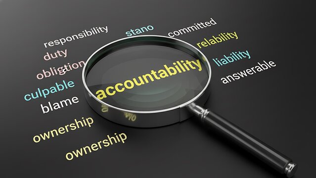Magnifying glass over the word accountability, surrounded by related terms like responsibility, duty, and ownership on a dark background.
