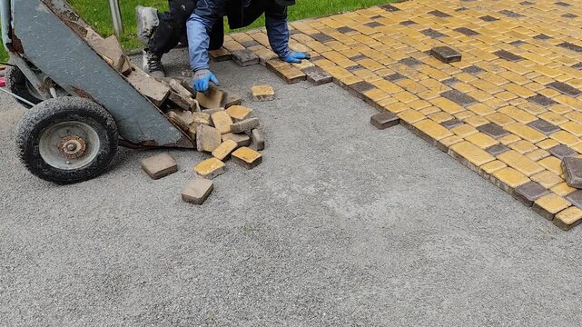 laying paving slabs