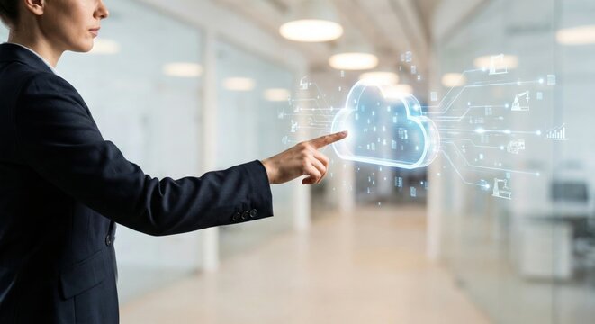 Businesswoman touching cloud icon in office