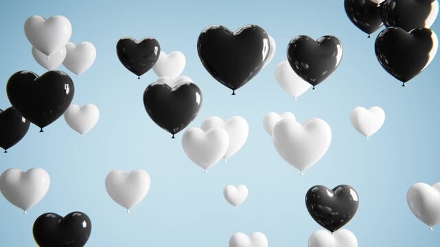 Black and white heart shaped balloons floating up against a light blue sky in a seamless loop. Seamless loop.