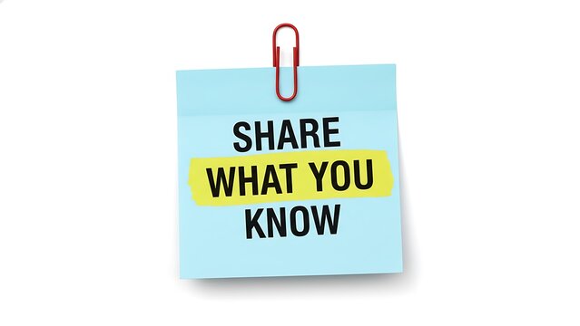 Light blue sticky note with red paperclip holding it, reads "SHARE WHAT YOU KNOW" in black text with yellow highlighter