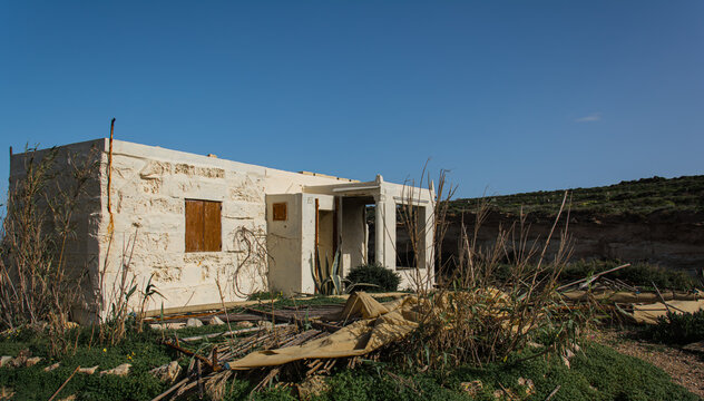 Abandoned Coastal House in Mediterranean Landscape