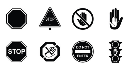 Collection of black and white stop signs and hand halt symbols displayed