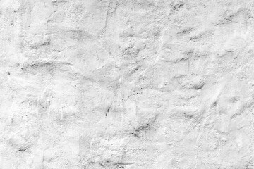 Obraz premium Textured white concrete wall with subtle imperfections and natural lighting