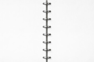 Clean metal discbound notebook spine mockup on white paper background, minimal stationery layout for planners and journaling designs