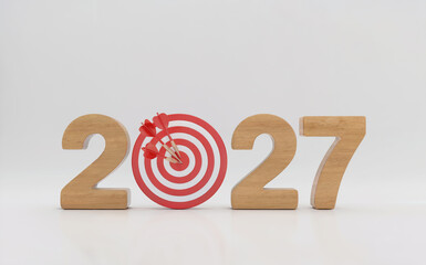 Wooden 2027 New Year Numbers with Red Dartboard Target Hitting Bullseye for Business Goal Concept