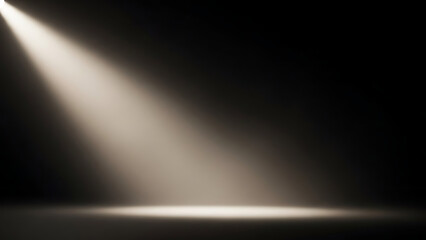 Dramatic spotlight illuminates an empty stage in a dark room.