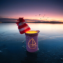 unique self created maritime lantern with knitted hat in winter season