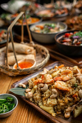 Thai chicken fried rice with pineapple and cashew on modrn bangkok restaurant table in thailand