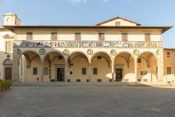 Renaissance facade of Ospedale del Ceppo, Pistoia, Italy, with glazed terracotta frieze by Santi Buglioni and tondoes by Giovanni della Robbia.