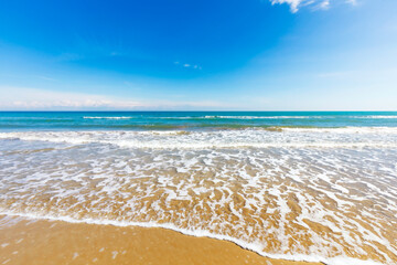 Wave crashes on the sand, seascape