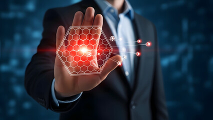 Businessman presenting innovative technology concept with glowing hexagon