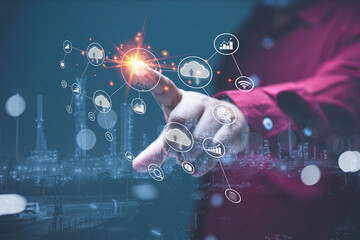 A businessman touching or interacting with a virtual network, including the cloud icon