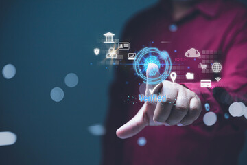 A person performing a fingerprint scan for biometric security verification.