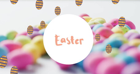 Image of easter text over colourful easter eggs on white background
