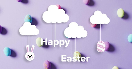 Image of happy easter text over clouds with colourful easter eggs on purple background