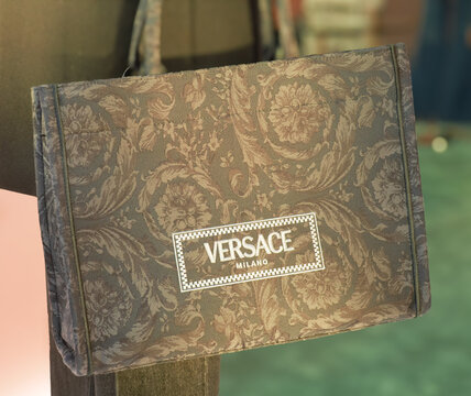 Athena Barocco by Versace, luxury tote bag in brown fabric with floral pattern. Milan - Italy, 6 January 2026