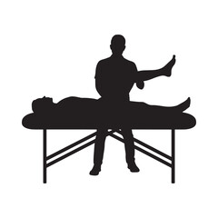 Fototapeta premium Silhouette of a physical therapist working with a patient on a table