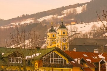 The city of St. Gilgen and the Collegiate Church during the winter, near Salzburg, Austria