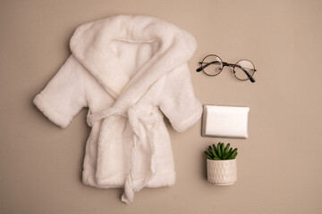 Newborn clothes with toys and flowers in a beautifully folded position for a photo © VideofotKA