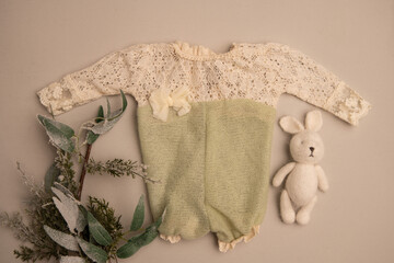 Newborn clothes with toys and flowers in a beautifully folded position for a photo © VideofotKA