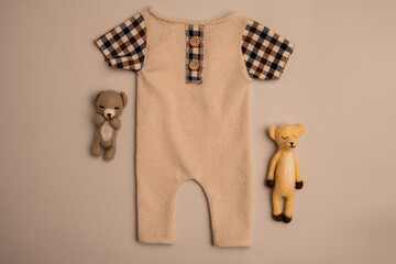 Newborn clothes with toys and flowers in a beautifully folded position for a photo © VideofotKA