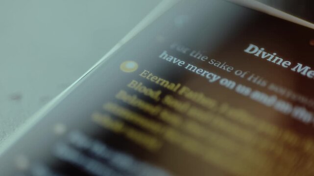 Chaplet of Divine Mercy, Catholic devotion, text displayed on mobile phone screen