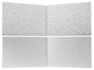 Open plastic embossing folder with abstract textured surface on a transparent background