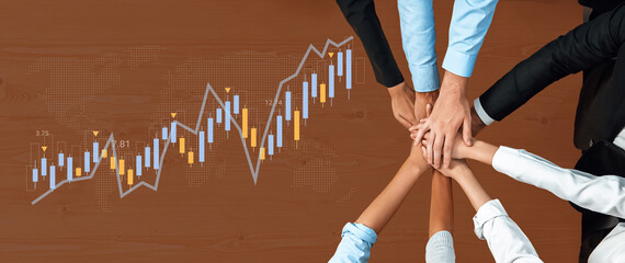 A dynamic scene capturing teamwork with hands joined over a growth graph on a wooden table, symbolizing cooperation and success in business strategies and financial markets. Gantry