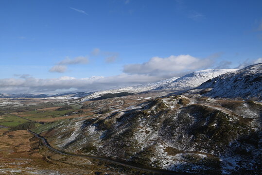 a view walking up a snowy Cadair Idris in south Gwynedd, wales from the mach loop