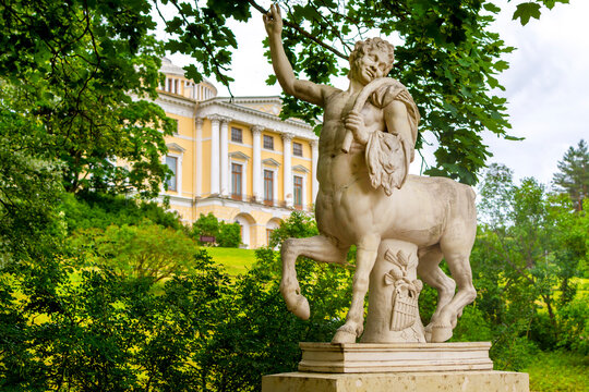 Saint Petersburg, Russia - june15, 2025: Pavlovsk palace and Centaur bridge statue in Pavlovsky park in summer