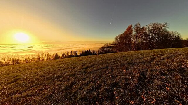 4K Timelapse video with moving clouds near sunset or sundowner at Kostenz, Perasdorf, Straubing, Bogen, Bavarian Forest, Bavaria, Germany