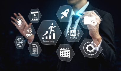 A businessman interacts with a digital interface showcasing various icons representing productivity, innovation, and technology for a modern corporate environment. Gantry